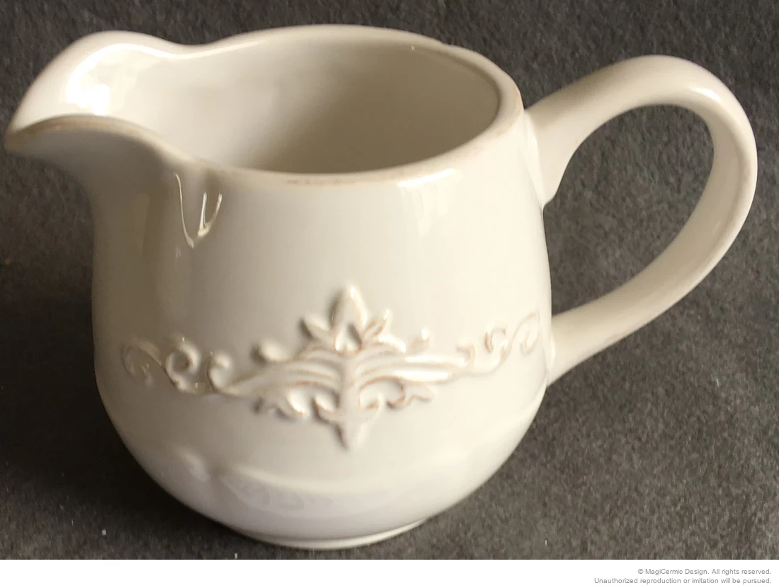 Original classical fleur scroll relief product photograph from supplied PDF