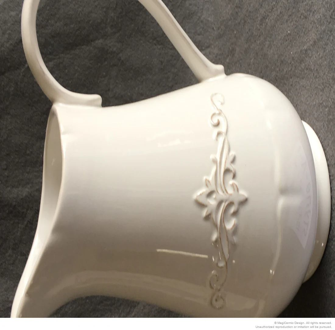 Original classical fleur scroll relief product photograph from supplied PDF