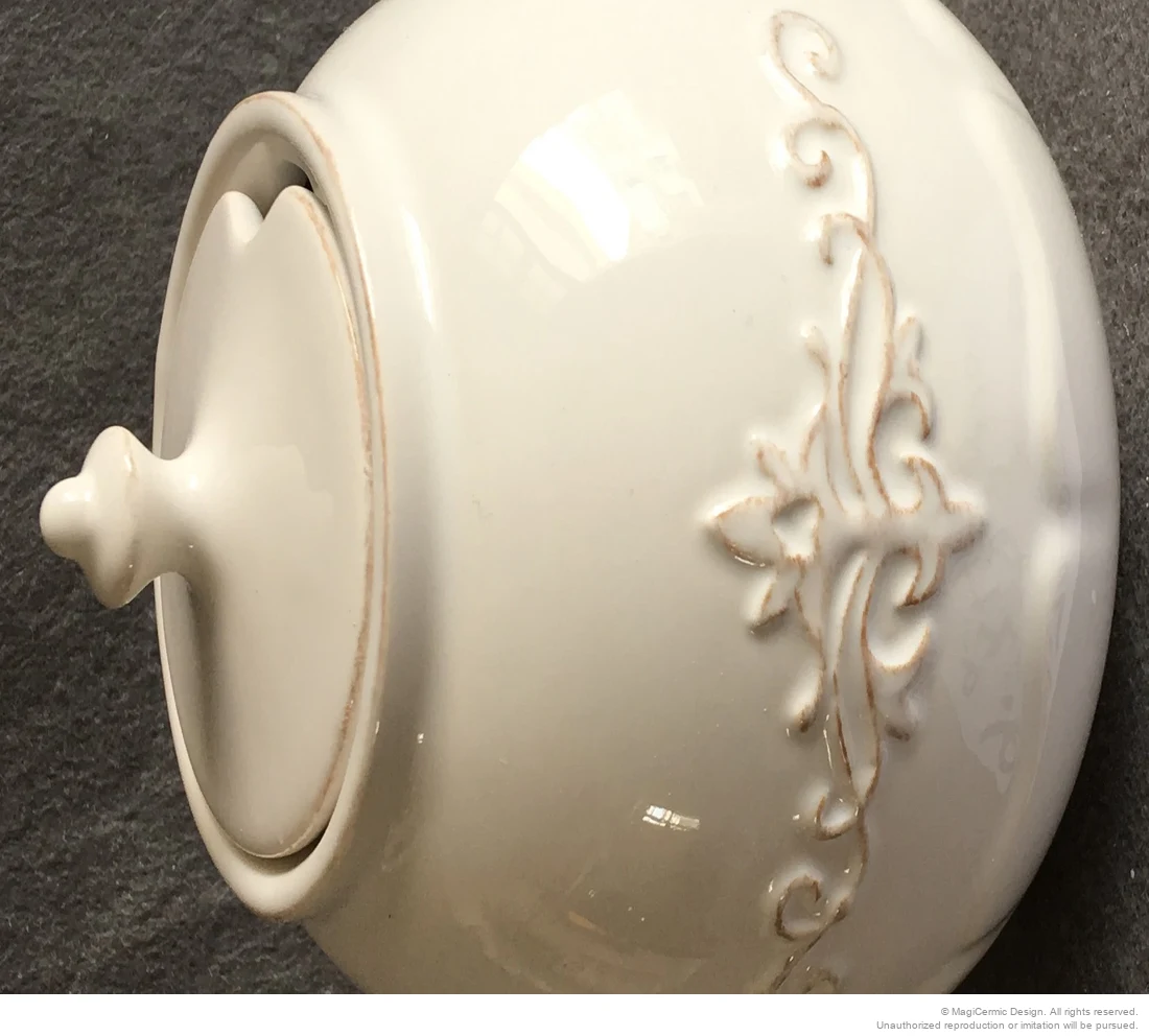 Original classical fleur scroll relief product photograph from supplied PDF
