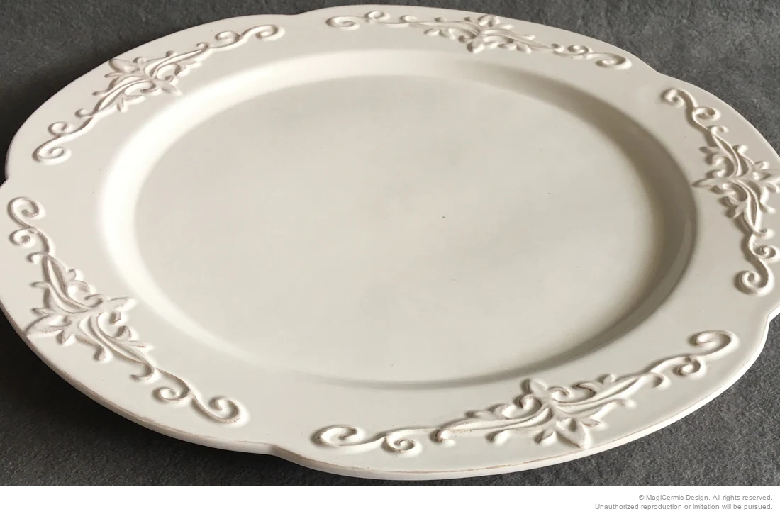 Original classical fleur scroll relief product photograph from supplied PDF