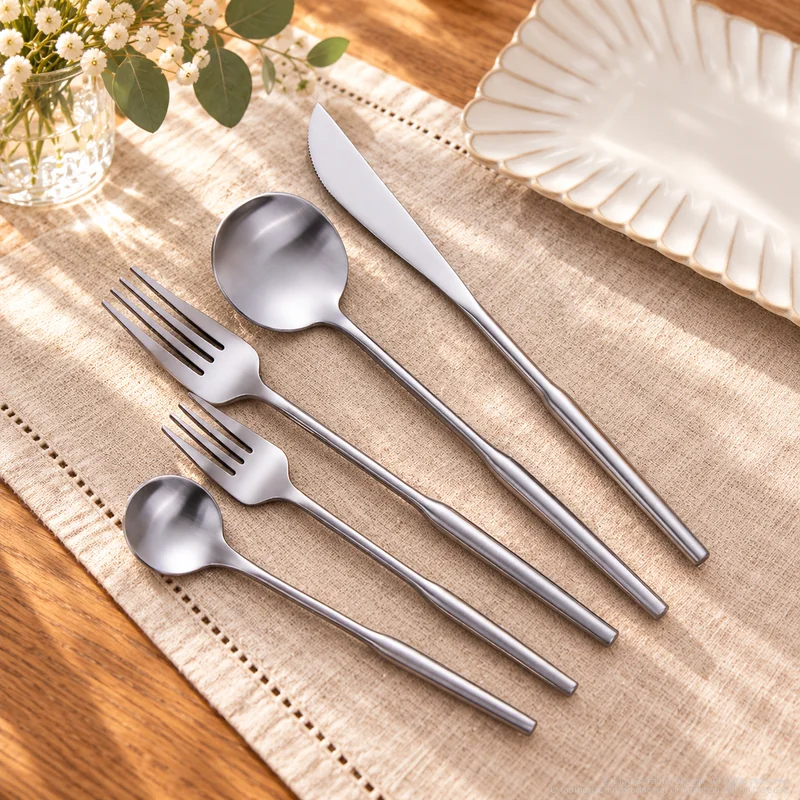 MCF-1090B flatware in an table-setting scene with MGB5799 ceramic tableware