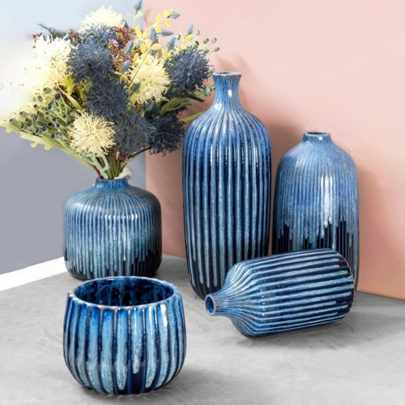 Blue ribbed ceramic vase collection